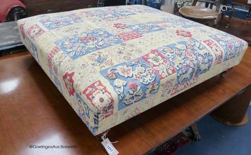 A Victorian style upholstered footstool in Andrew Martin fab...