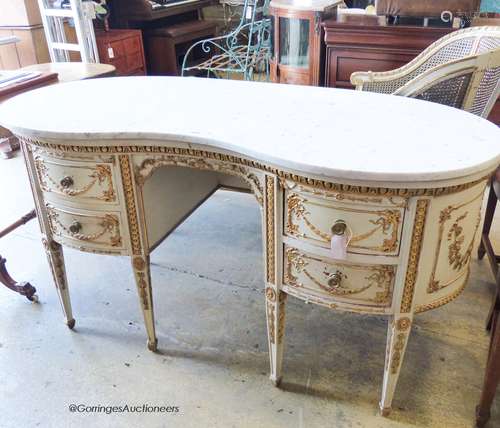 A Louis XVI style parcel giltwood and painted kidney shaped ...