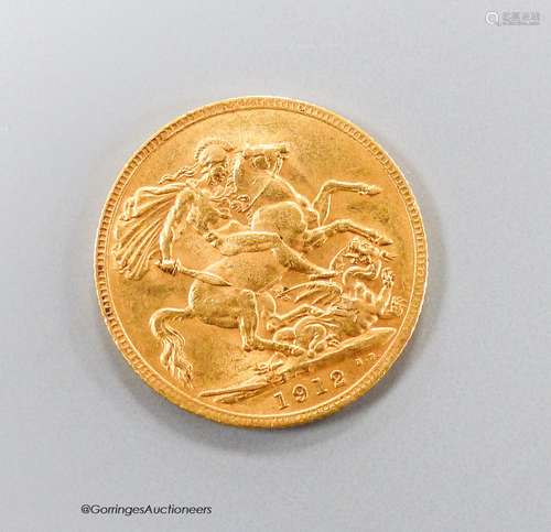 A George V 1912 gold sovereign, GVF.