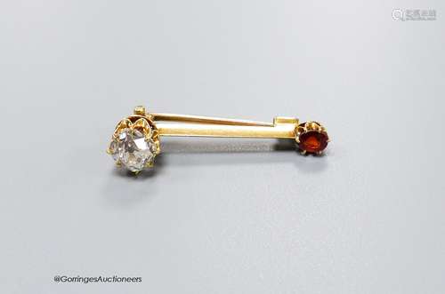 A small yellow metal, cushion cut diamond and garnet? set tw...