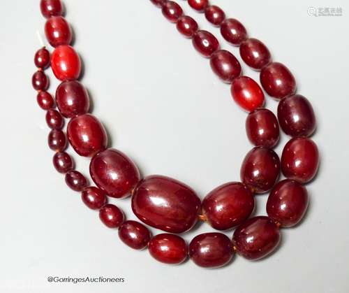 A double strand simulated oval cherry amber bead choker neck...