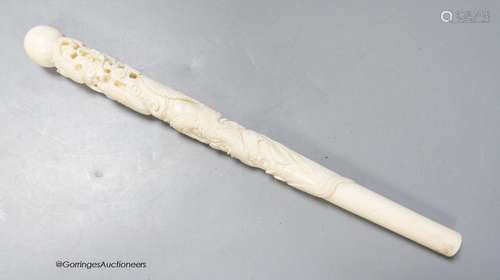 A Japanese ivory 'dragon' parasol handle, early 20th century...