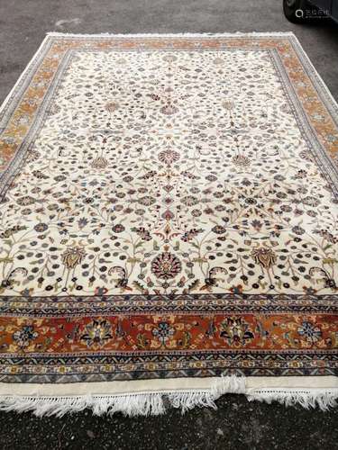 An Isphahan ivory ground carpet, 420 x 302cm