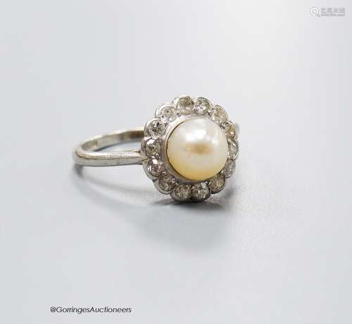 A 1920's white metal (stamped platinum), cultured pearl and ...