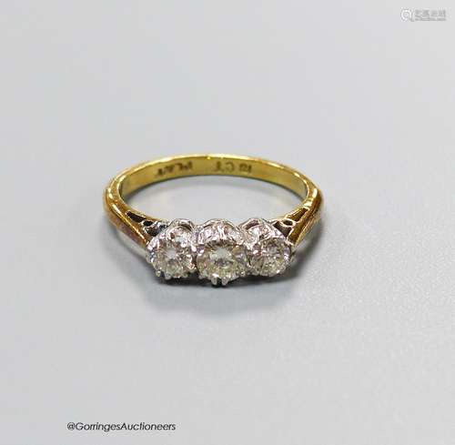 An 18ct & plat and three stone diamond set ring, size J, gro...