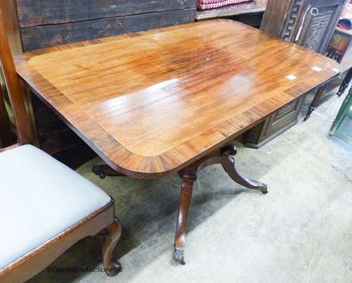 A small Regency banded mahogany rectangular tilt top breakfa...