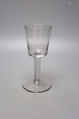 A mid 18th century glass wine goblet, bucket bowl, height 21...