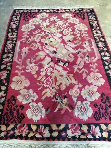 A red ground flat weave Kelim rug, 220 x 150cm