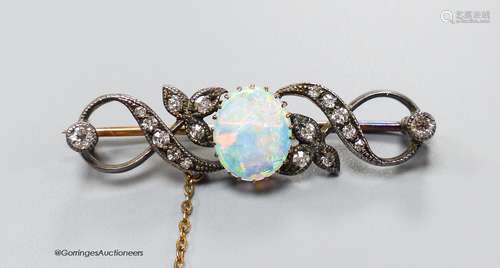 A late Victorian white opal and diamond cluster set scroll b...