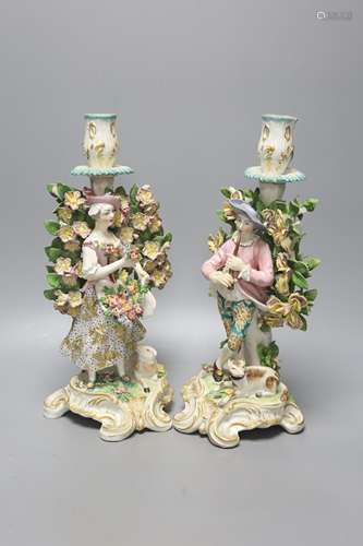 A pair of Derby style candlestick figures, height 27cm