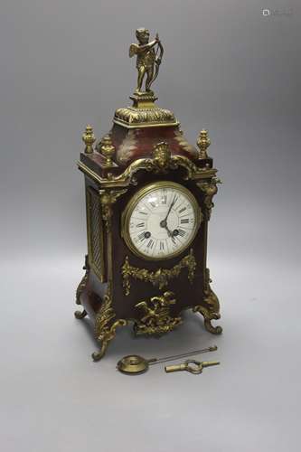 A 19th century French ormolu mounted boulle mantel clock, wi...