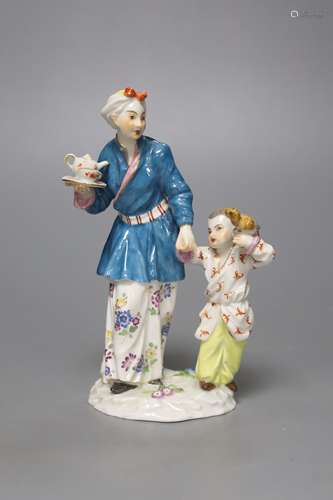 A Meissen group of a Chinese lady and a boy, 20th century, h...