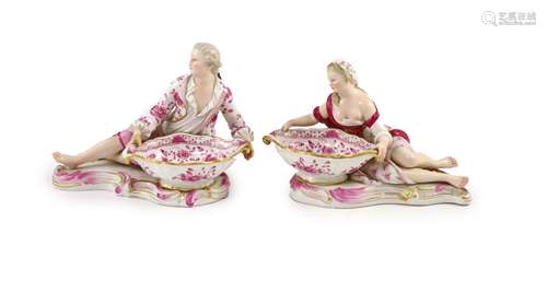 A pair of 19th century Meissen figural sweetmeat dishes