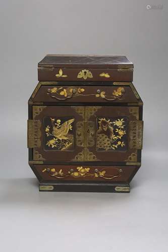 A Japanese lacquered brass bound table top cabinet, height 2...