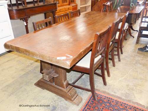 An 18th century style rectangular oak refectory dining table...