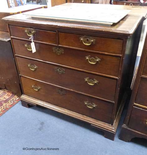 An 18th century oak chest fitted two short drawers and three...