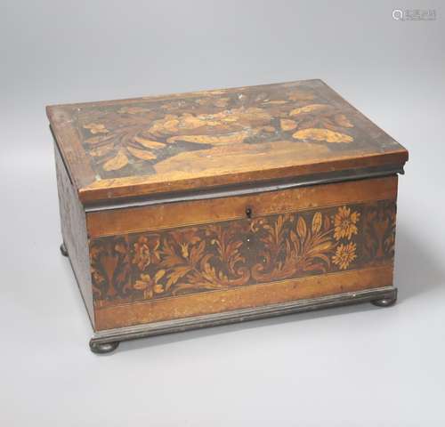 An unusual George IV ebony and marquetry inlaid tea caddy, 3...