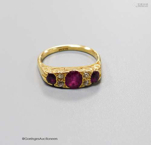 An early 20th century 18ct, three stone ruby and four stone ...