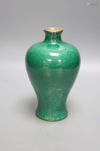 A Chinese green ground crackle glazed porcelain baluster vas...