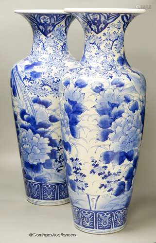 A pair of large Japanese blue and white vases (one a.f.), 60...