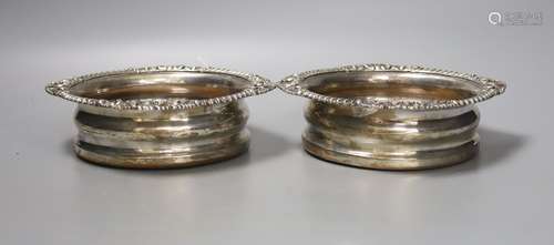 A pair of Victorian plated wine coasters, largest 17cm