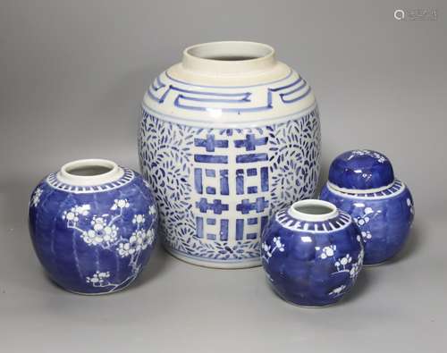 Four Chinese blue and white ginger jars, one with cover, tal...