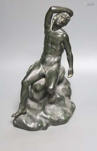 After the Antique a bronze figure of a man seated on a rock,...