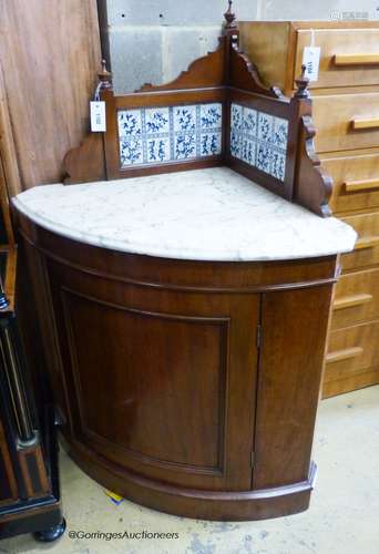 A Victorian mahogany marble topped tile back corner wash sta...