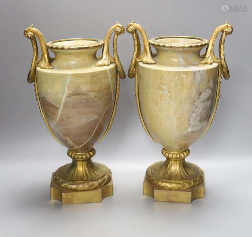 A pair of gilt metal and marble urns, overall height 34cm