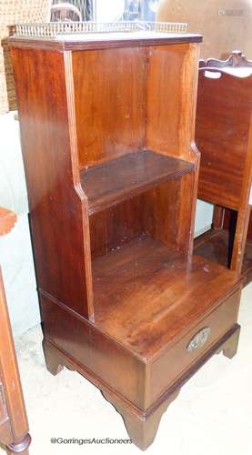 A small George III style mahogany open bookcase, with steppe...