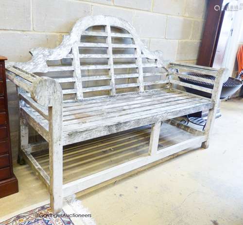 A weathered teak Lytchens style garden bench, length 160cm, ...