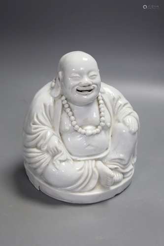 A Chinese blanc de chine porcelain model of Budai, height 16...