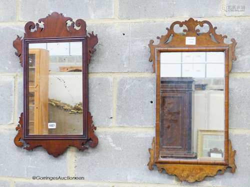 Two George III style walnut fret cut wall mirrors, largest W...
