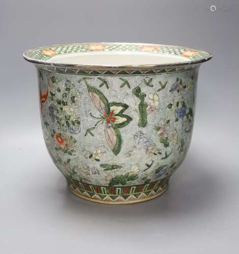 A 20th century Chinese pale blue ground jardiniere, painted ...