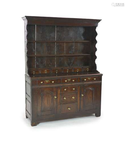 An 18th century oak dresser,The rack with moulded cornice an...