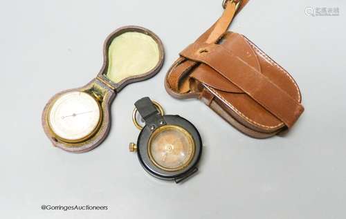 A small leather-cased military compass together with a cased...