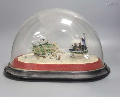 A Victorian spun glass diorama of ships, under a glass dome,...