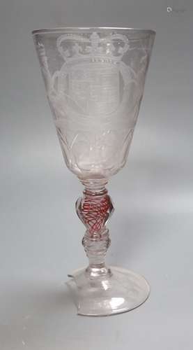 A Bohemian ruby twist engraved armorial goblet and cover, ci...