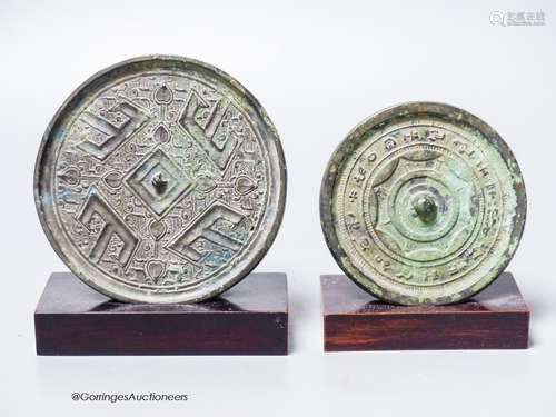 Two Chinese archaic bronze circular mirrors, etc., largest 1...