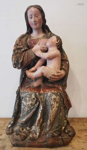 Vierge allaitante en chêne sculpté et polychromé, dos en par...