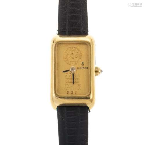 A Corum UBS Ingot 999.9 Gold Bar & 18K Watch