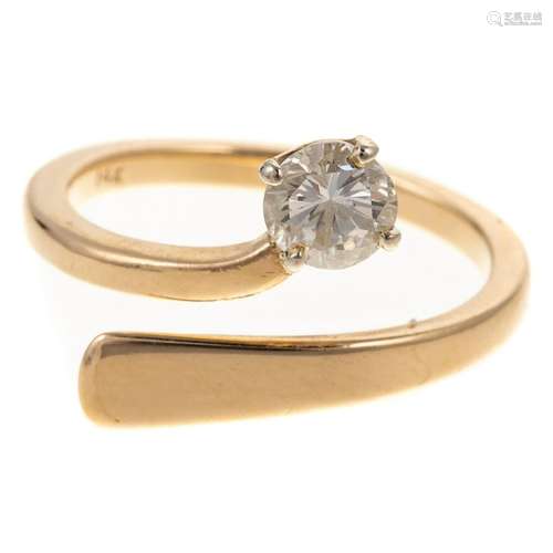 A 0.50 ct Round Diamond Bypass Ring in 14K