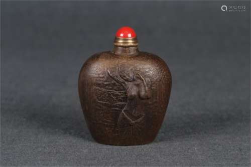 A Carved Agarwood Snuff Bottle with Calligraphy