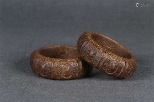 A Pair of Carved Agarwood Bracelets