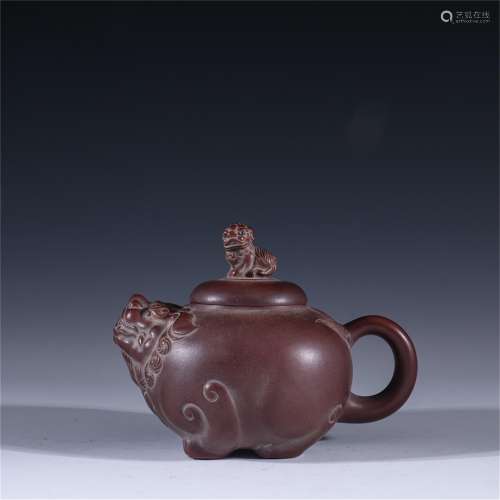 A Carved Yixing Zisha Beast Patterned Teapot