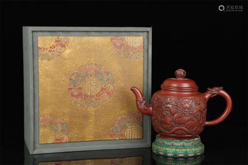 A Carved Yixing Zisha Teapot with Dragon & Phoenix