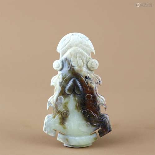 A Carved Jade Beast Patterned Pendant
