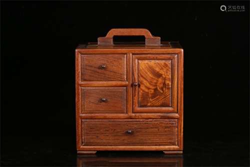 A Carved Hardwood Cabinet