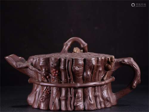 A Carved Yixing Zisha Stump Shaped Teapot
