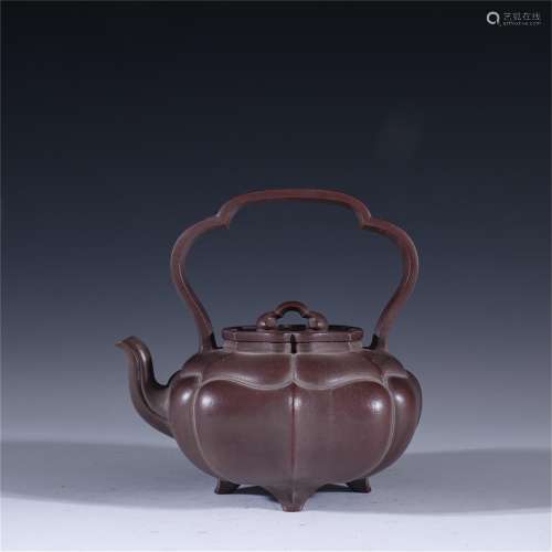 A Carved Yixing Zisha Teapot with Handle